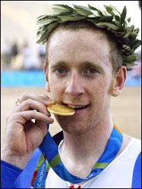 Britain's Bradley Wiggins and his medal