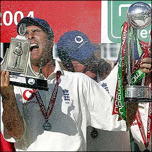 MIchael Vaughan celebrates with the Wisden Trophy