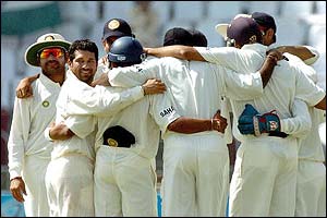 Sachin Tendulkar celebrates with his team-mates after dismissing Shoaib Akhtar