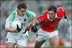 Mayo skipper Gary Ruane tries to halt Fermanagh's Colm Bradley
