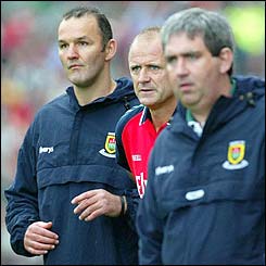 John Maughan (centre) and his management team 