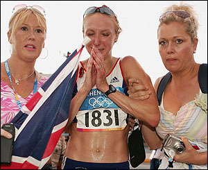 Paula Radcliffe is consoled by friends