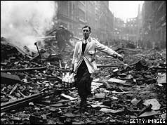 Milkman delivering through wreckage