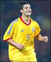 Defender Christian Chivu celebrates scoring at Hampden Park