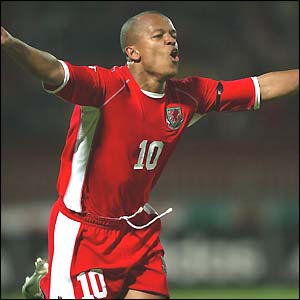 Robert Earnshaw celebrates scoring Wales' winner