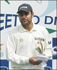 Sehwag picks up a hard-earned award for his superb batting display
