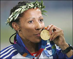 Holmes enjoys her golden moment