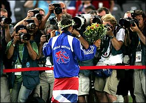 Great Britain's Kelly Holmes poses for photographers 