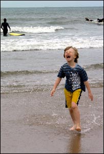 Max Milburn enjoying the sea, Rhossili bay, sent in by Steve Ball