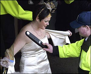 All racegoers are scanned by a metal detector before gaining entry to Aintree