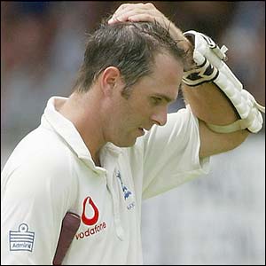 Vaughan walks back to the pavilion 