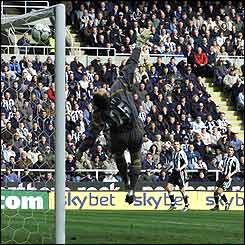 Nigel Martyn tries to keep out Newcastle's second goal