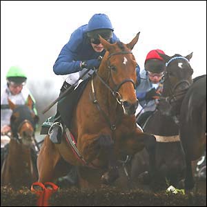 Amateur jockey JP Magnier lands the Martell Cognac Aintree Hurdle on Rhinestone Cowboy