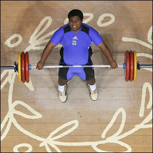 Itte Detenamo of Nauru competes in the men's over 105 kg category weightlifting