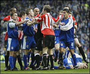 Referee Paul Durkin has to step in to calm things down 