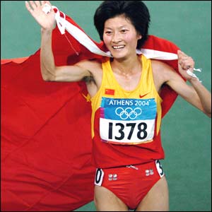 China's Xing Huina celerbates her golden victory