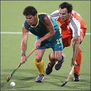 Australia's Brent Livermore dribbles against the defense of Holland's Karel Klaver