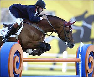 British jumping rider Nick Skelton clears a fence on his horse Arko III