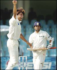 Sami gets the lbw decision against India's star batsman Sachin Tendulkar to put the tourists deep in trouble