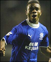 Joseph Yobo celebrates scoring for Everton