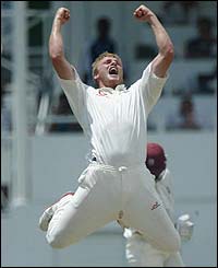 England's Andrew Flintoff celebrates removing Daren Ganga