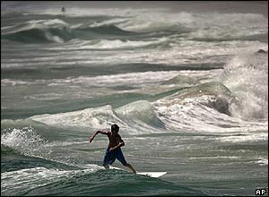 Surfer braves sea ahead of Hurricane Frances
