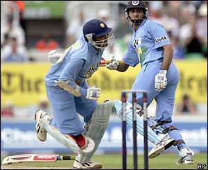India's captain Sourav Ganguly loses his bat after crashing into VVS Laxman and is run out by Andrew Flintoff