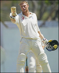 Andrew Flintoff of England celebrates reaching his century 