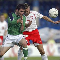 Damien Johnson tries to get past Damien Gorawski