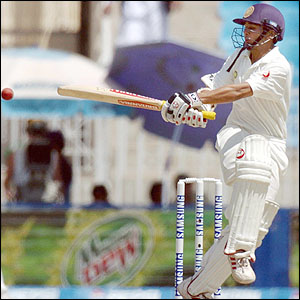 Parthiv Patel hits a ball off Shoaib Akhtar