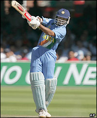 Sourav Ganguly opens the batting for India and makes a half century