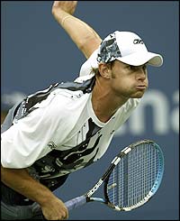 Andy Roddick powers a serve to Guillermo Canas