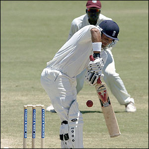 Mark Butcher plays a defensive shot