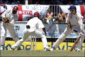 Michael Vaughan edges a perfect leg-break from Sarwen straight into Jacobs's grateful gloves 