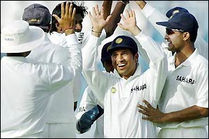 Farhat is caught by Virender Sehwag off the bowling of Lakshmipathy Balaji