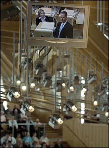 Jack McConnell is shown on a television screen