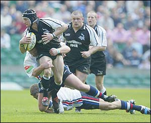 Newcastle's Jamie Noon tries to break through the Sale defence
