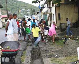 Locals begin the huge clean-up task in Castries, St Lucia