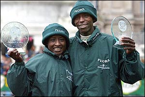Winners Margaret Okayo and Evans Rutto pose with their trophies