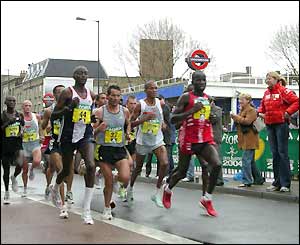 A group of the leading male runners pound past Bermondsey tube station