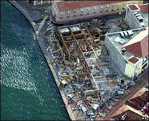 A devastated warehouse in St George's harbour, Grenada, after the passing of Hurricane Ivan