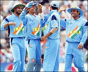 India celebrate beating Kenya in their opening Champions Trophy game