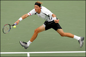 Johansson holds his own in the second set as the in-form Hewitt delivers some fine shots