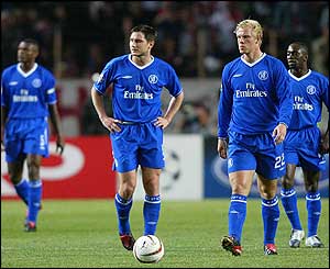 The Chelsea players show their dejection after Monaco score 