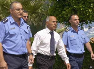 Mordechai Vanunu is escorted from prison