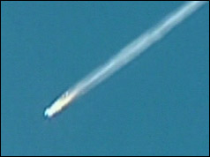 Shuttle falls to earth in flames