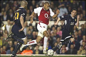 Thierry Henry evades Leeds' defence with ease