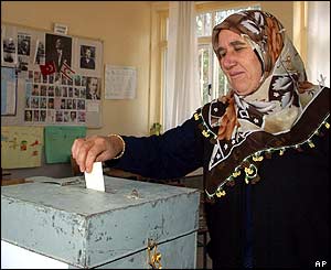 A Turkish settler casts her ballot in Risokarpaso