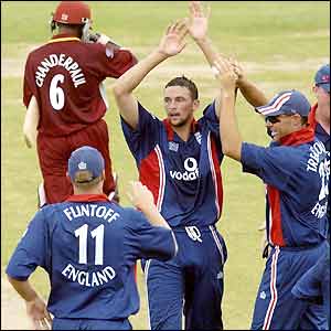 Steve Harmison celebrates taking the wicket of Shivnarine Chanderpaul