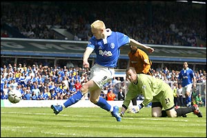 Mikael Forssell waltzes through the Wolves defence to make it 1-1